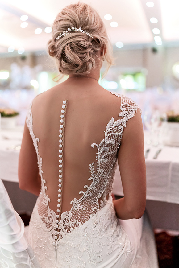 Beautiful wedding dress back detail at the Galway bay hotel in Galway wedding photography by Gerard Conneely